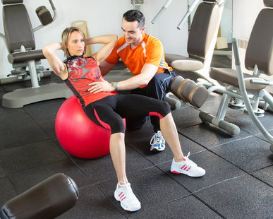 image of a lady and her personal trainer